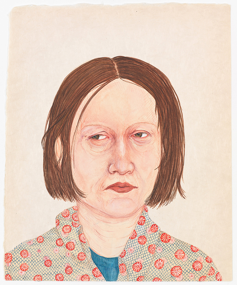 Portrait of a woman wearing a blue and pink shirt