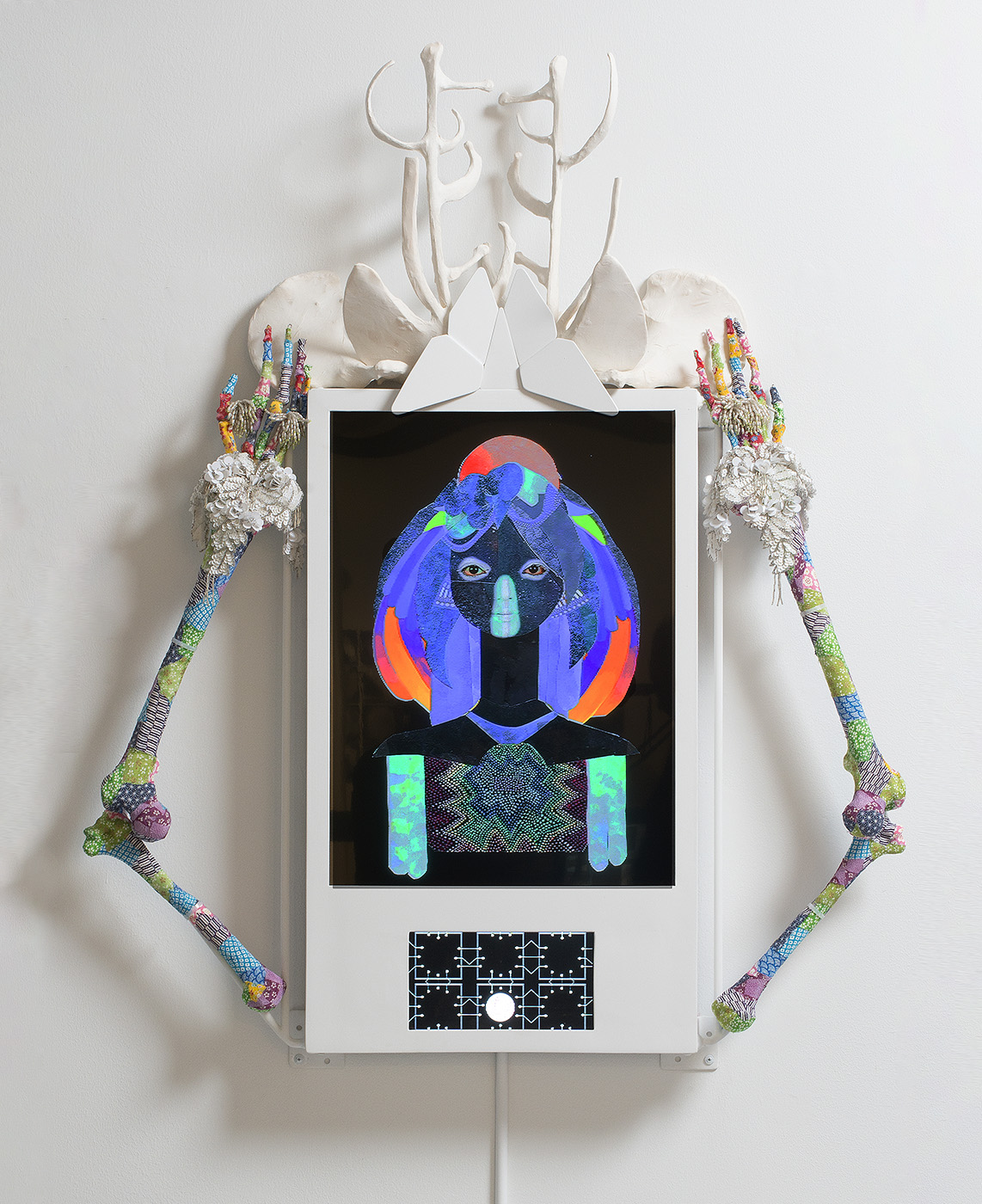 sculpture with avatar video and human bones
