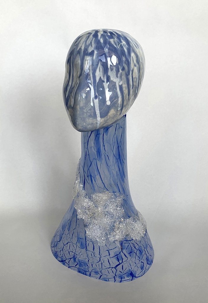 Ceramic bust with glass head covered with blue paint